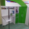 Детская кровать-чердак зеленого цвета с местом для хранения и рабочей зоной
