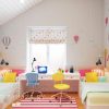 Яркая детская комната для двоих детей старше трех лет