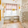 Светлая детская комната для двоих детей от трех лет