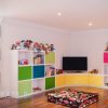 Яркий цветной комплект мебели в детскую для детей от трех лет